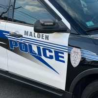 Man Charged In Shootout That Nearly Killed Bystander In Malden Apartment Lobby
