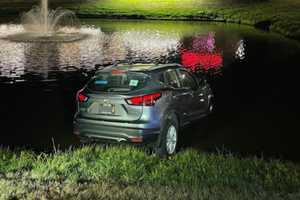 Person Hospitalized After Car Dives Into Millis Pond: Police