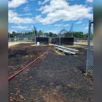 <p>The grass fire torched nearly two acres at Pye Brook Park in Topsfield</p>