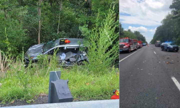 Massachusetts State Troopers arriving on the scene of the crash in Uxbridge