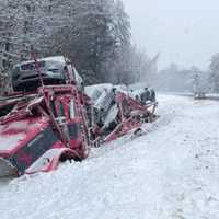 <p>A car carrier driven by a man from Stamford, CT, crashed on the side of I-89 South in Warner, NH on Monday, Jan. 23</p>