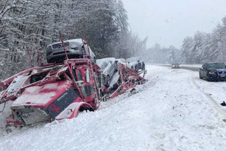 Dislodged Car Falls Onto Carrier Driven By Stamford Man On Slippery NH Highway