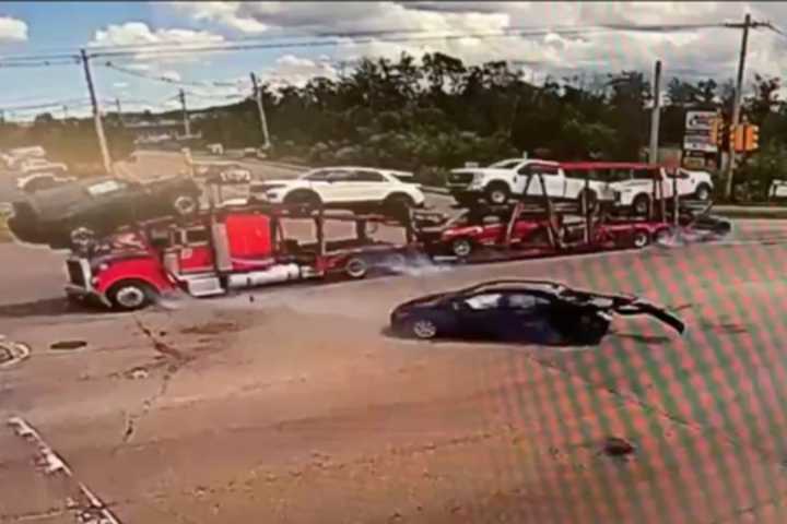 WATCH: Car Carrier Clips Vehicle While Running Red Light In Boston Suburb