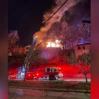 <p>Crews on the scene of a multi-alarm fire on Terrace Road in Medford</p>