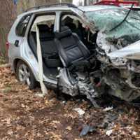 <p>The aftermath of a car that crashed into a tree in Topsfield on Tuesday, April 25</p>