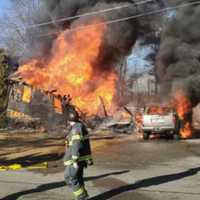 <p>Crews battling a fire in the area of 2351 Central Street in Stoughton on Saturday, Feb. 18</p>