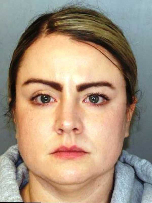 DA: Female Trooper Pretends To Be Man On Dating Site, Threatens LI Woman