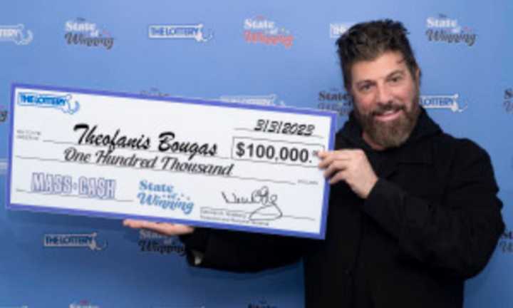 Theofanis Bougas with his winning check.