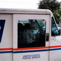 <p>A USPS mail truck.</p>