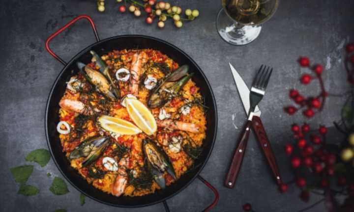 A fresh seafood paella is just one of the options at the restaurants near Fenway Park.