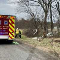 <p>Littleton firefighters and police officers responded to the rollover crash.</p>