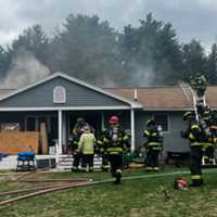 <p>The two-alarm fire displaced a family of three, injuring two people and leading to the death of a cat.</p>