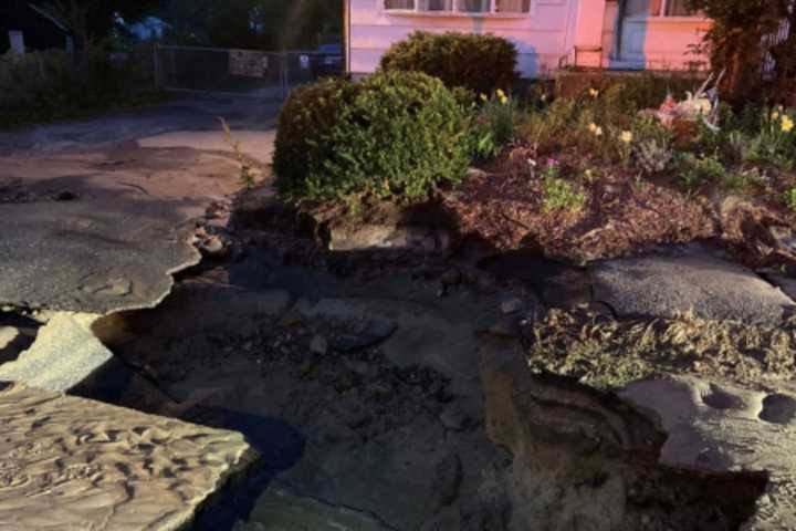 Road Cracks Open, Multiple Driveways Ruined In Methuen Water Main Break