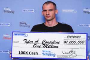 Lottery Winner Returns To Work After Picking Up $1M Check