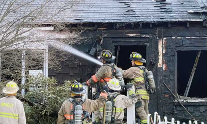 Dracut firefighters on Lakeview Avenue.