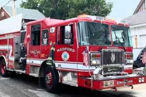 Construction Worker Hospitalized After Fall From Medford Home's Roof Into Basement