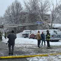 <p>A ladder truck crew worked on rescuing the trapped man while an engine crew focused on extinguishing the fire.</p>