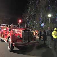 <p>Santa arrived for the Demarest tree lighting Tuesday night in his sleigh, which looked much like a fire truck, to the delight of waiting children.</p>