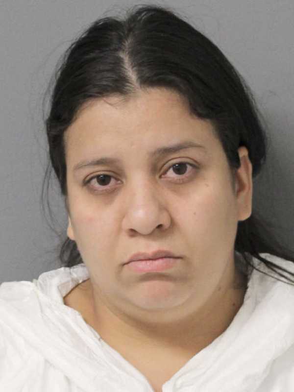 Woman Stabs Man In Front Of Child At Long Island Home