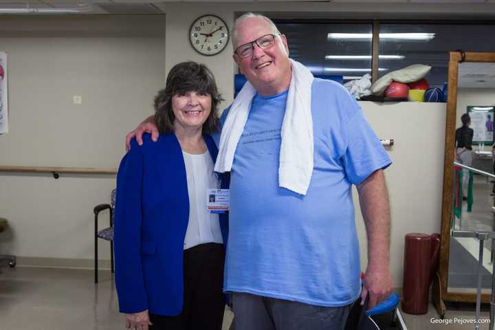 Cardinal Timothy Dolan with Dr. Mary Leahy, CEO of Bon Secours Charity Health System.