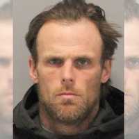 Man Threatens Officer With Assault Rifle on Long Island, Police Say