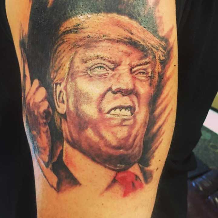 This is just one of the tattoos of Republican presidential candidate Donald Trump being offered free at Anarchy Ink, a tattoo parlor in Orange County&#x27;s Slate Hill.