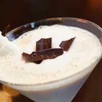 <p>Enjoy a special Frosty Day cocktail, created by Modern Barn, in your old silk hat.</p>