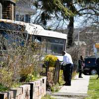 <p>The crash knocked an NJ TRANSIT bus onto a resident&#x27;s law during a police pursuit in East Orange on Sunday, March 26.</p>