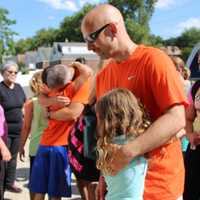 <p>BBC mission members saying goodbyes before leaving for Poland on Thursday.</p>