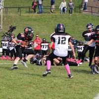 <p>Junior Aviator running back Anthony Dilascio looks to cut back on his way to the end zone late in the game.</p>