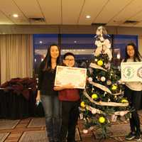 <p>Members of District 6 Little League with their 501(c) tree.</p>