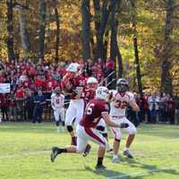 <p>Chris Sanders, of Pompton Lakes, intercepts Hasbrouck Heights quarterback Frank Quatrone&#x27;s pass on the last play of the first half.</p>