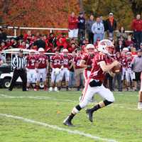 <p>Pompton Lakes quarterback Kevin Cotter looks down field late in the game needing a score to re-take the lead against Hasbrouck Heights.</p>