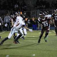 <p>Wildcat running back Cencir Bacote runs the ball against the Aviators early in the Super Bowl.</p>