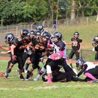 <p>Manchester running back Troy Leary Jr. tries to break through Hasbrouck Heights line.</p>