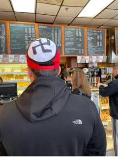 Man Wearing Cap With Swastika Escorted By Police Out Of White Plains Diner