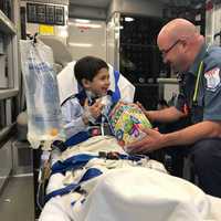 <p>James, age 6 and Pete Kessler, President of the Stamford Paramedic Association, Local R-1 684, a unit of IAEP</p>