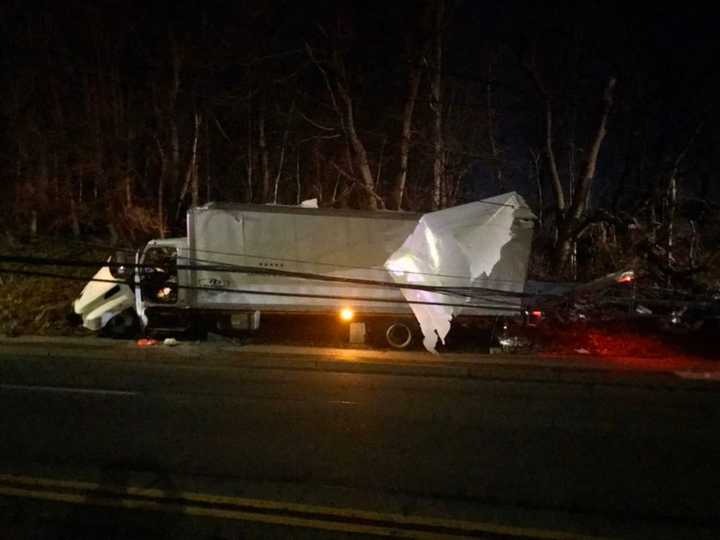 A truck crash in Northern Westchester closed a major roadway and took out power to some 400 residences.