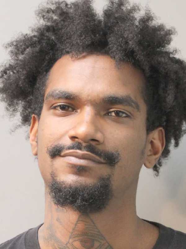 Man Nabbed With Loaded Weapon, Drugs During Elmont Traffic Stop, Police Say