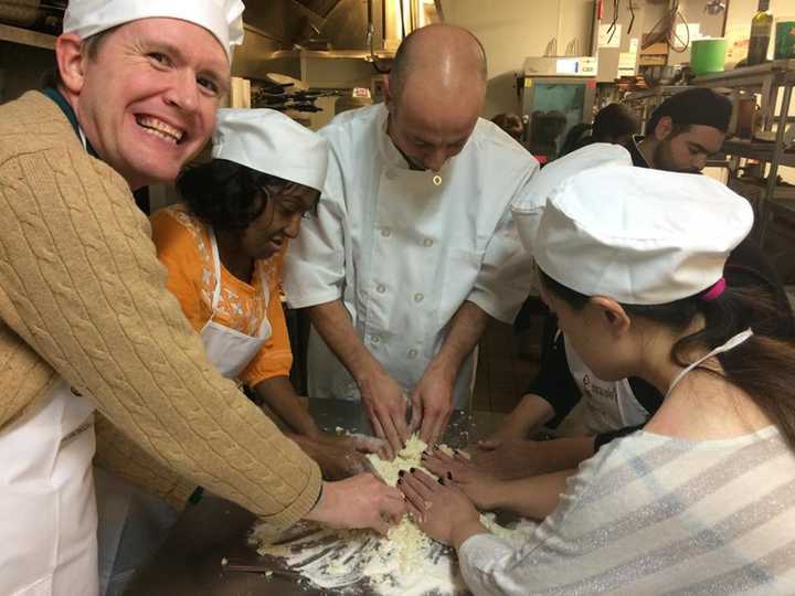 STAR, Inc. clients with Chef Pasquale De Martino making dough.