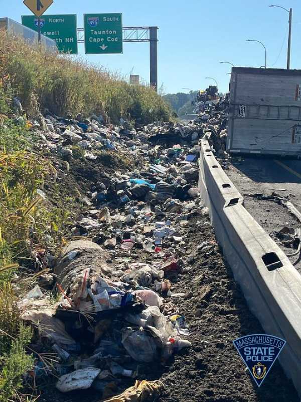 Rolled-Over Truck Spills Trash On Mass Pike Off-Ramp, Causes Closure