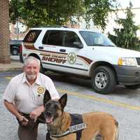 <p>Sheriff James Muller and K9 Deputy Alegra aka &quot;Leggy.&quot;</p>