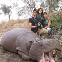 <p>A safari guide (left), Bianca Rudolph (center), and Lawrence &quot;Larry&quot; Rudolph (right).</p>