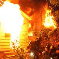 <p>Flames raced through the Summit Street house in Ridgefield Park.</p>