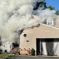 <p>Firefighters quickly converged on the 32nd Street home in Fair Lawn.</p>