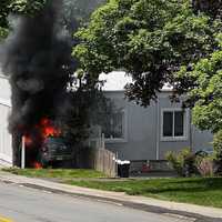 <p>A mother and daughter bailed out of the SUV moments before it plowed into the side of the commercial building and burst into flames in Leonia, witnesses said.</p>