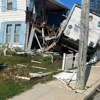 <p>A box truck crashed into a home Wednesday in Cecil County, volunteer firefighters said.</p>