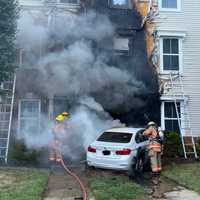 <p>The BMW plowed through the Gaithersburg home, officials said.</p>