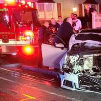 <p>One of the damaged cars from the head-on crash on Main Street</p>