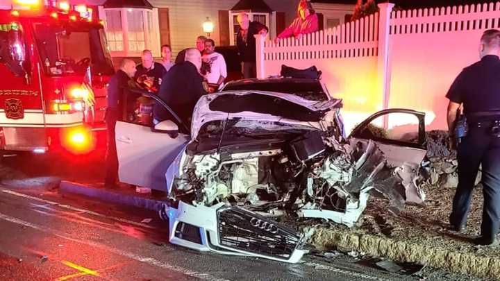 One of the damaged cars from the head-on crash on Main Street